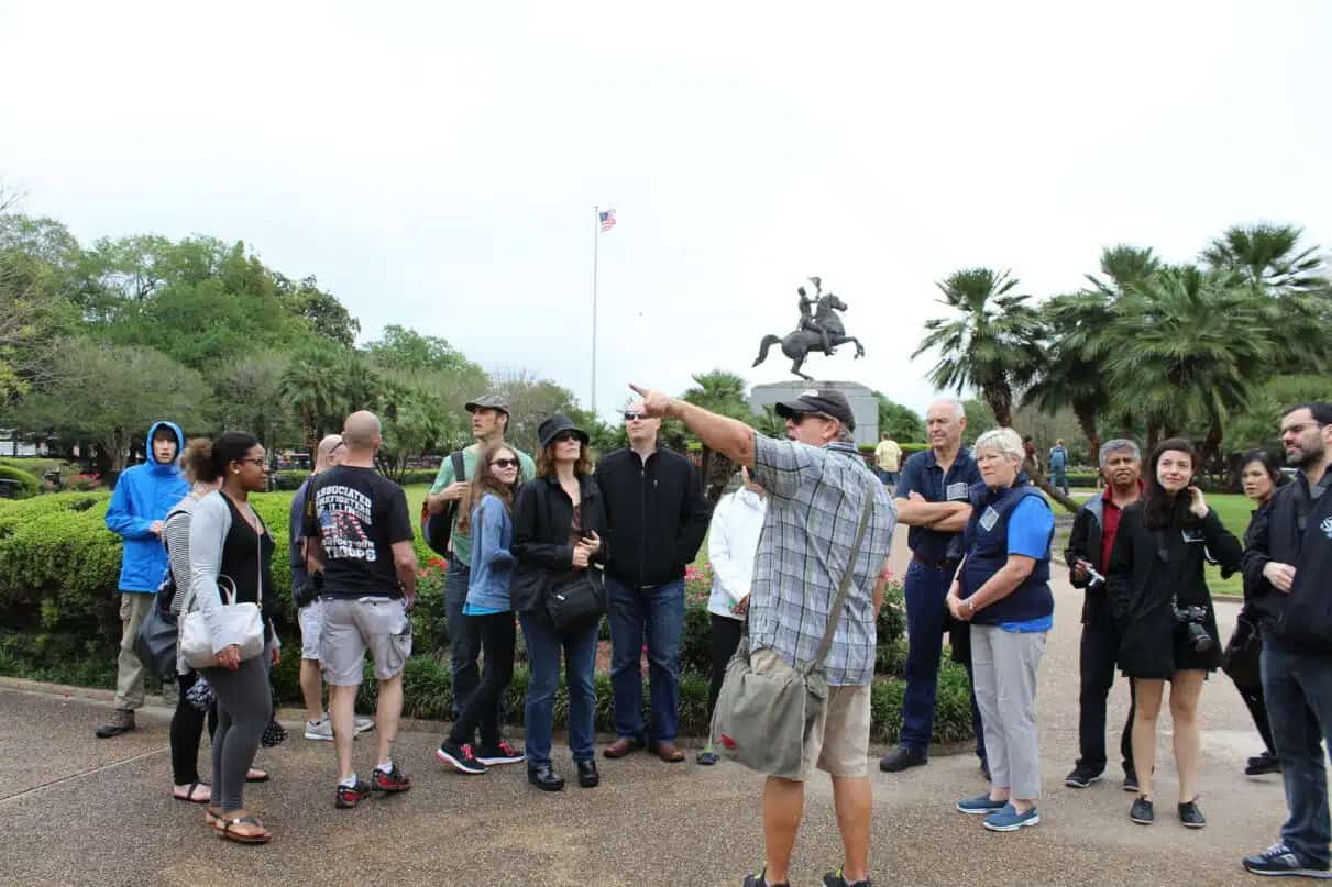 Group of tourists on a walking tour in the French Quarter, New Orleans