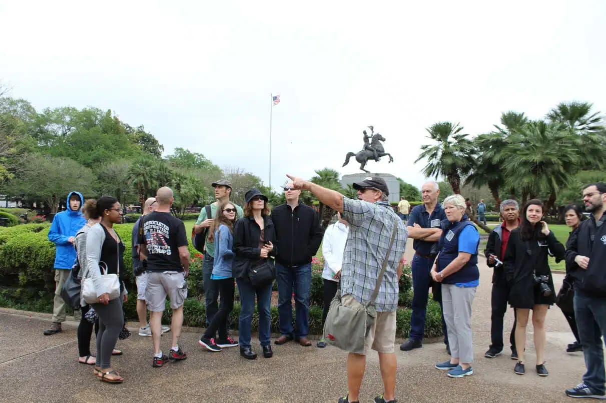 Group of tourists on a walking tour in the French Quarter, New Orleans