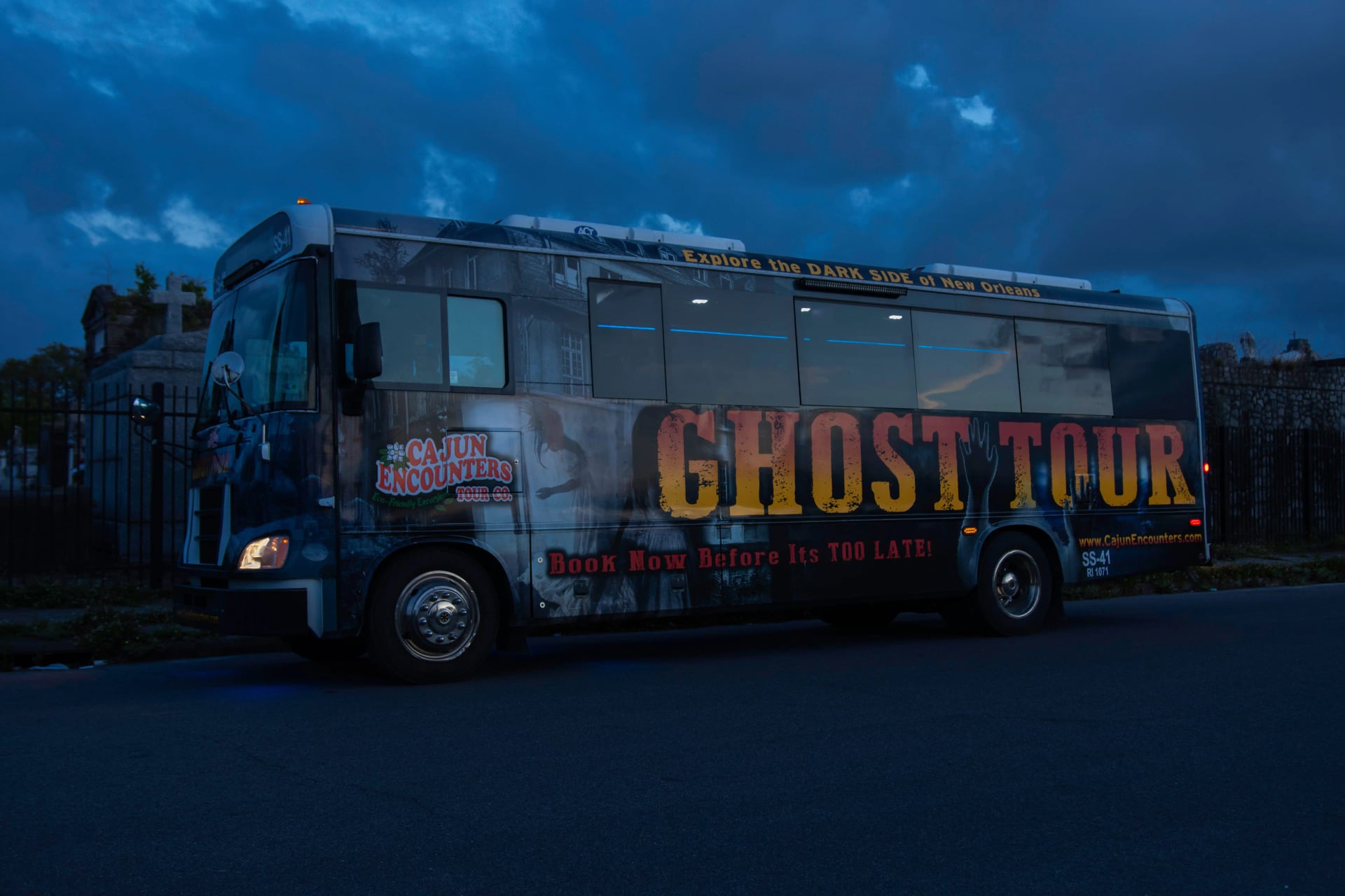 Ghost bus tour New Orleans - themed bus exterior at night