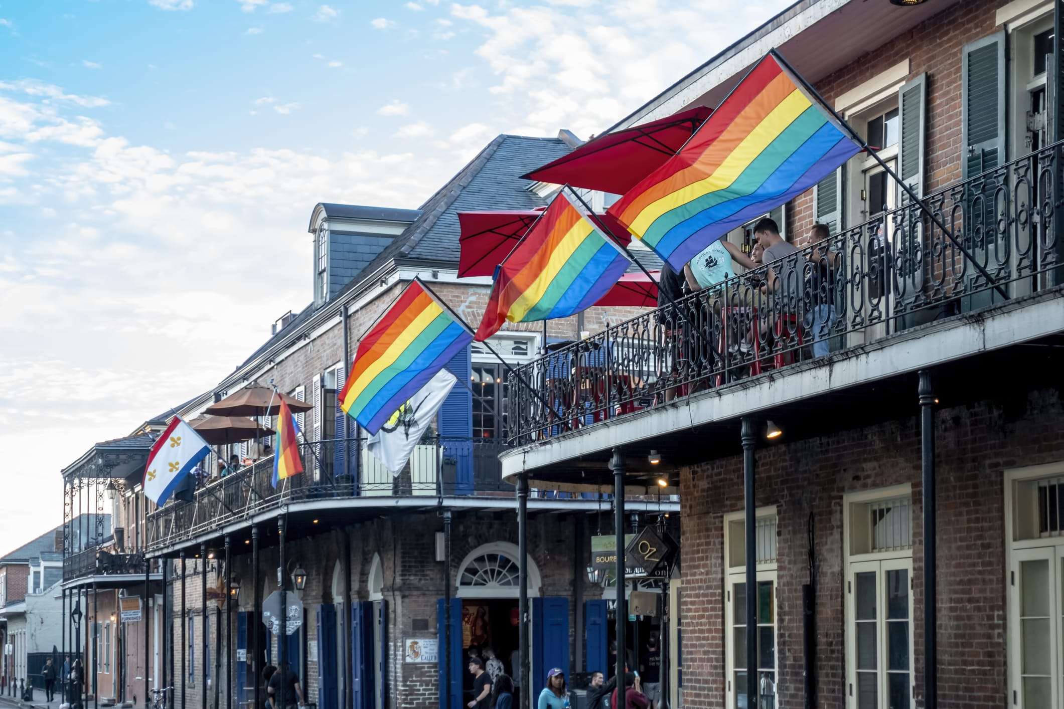 New Orleans attractions, pride flags on French Quarter balconies for Southern Decadence