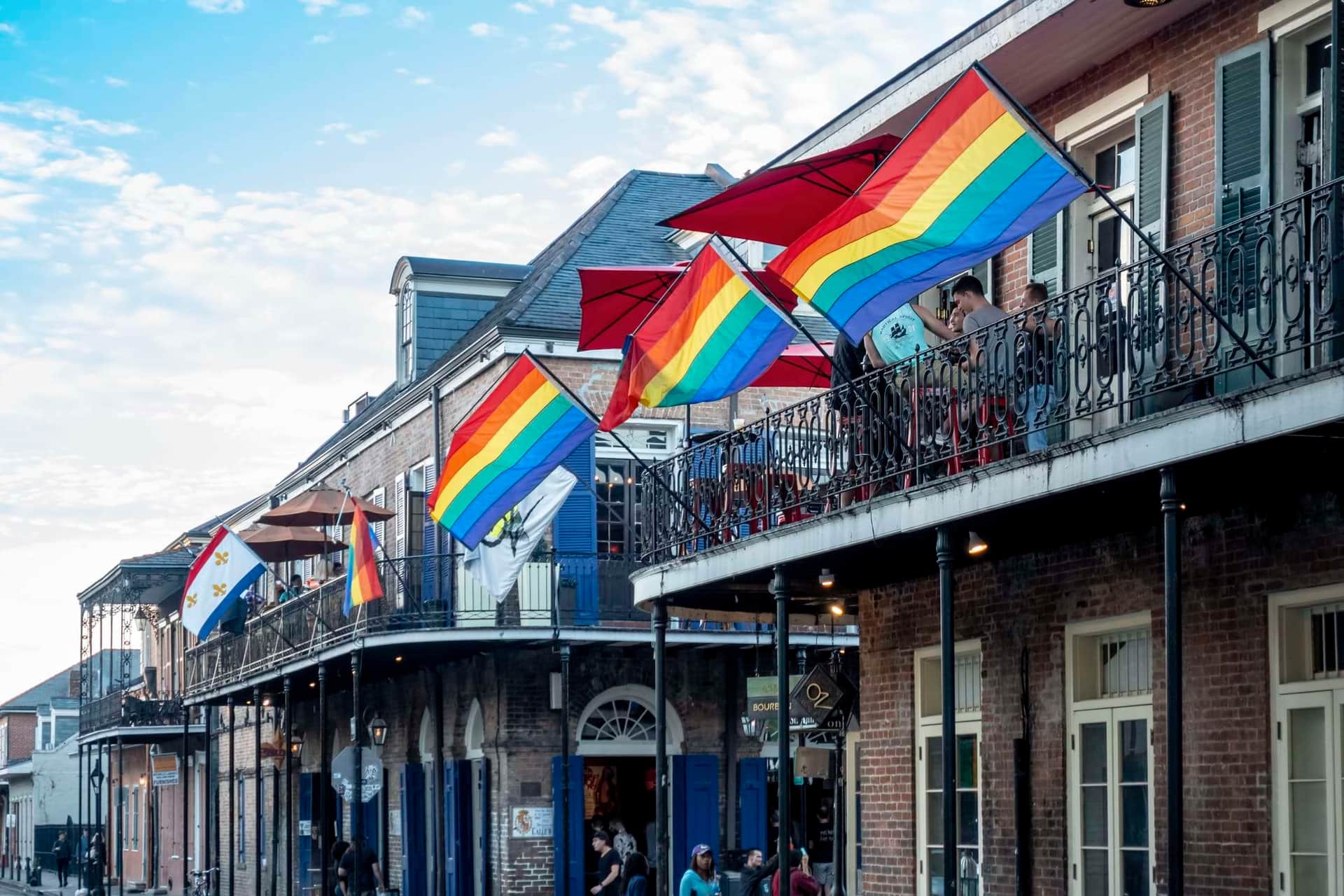 New Orleans attractions, pride flags on French Quarter balconies for Southern Decadence