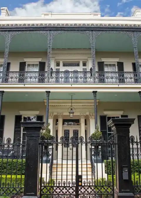 Garden District mansion with cast-iron gallery in New Orleans